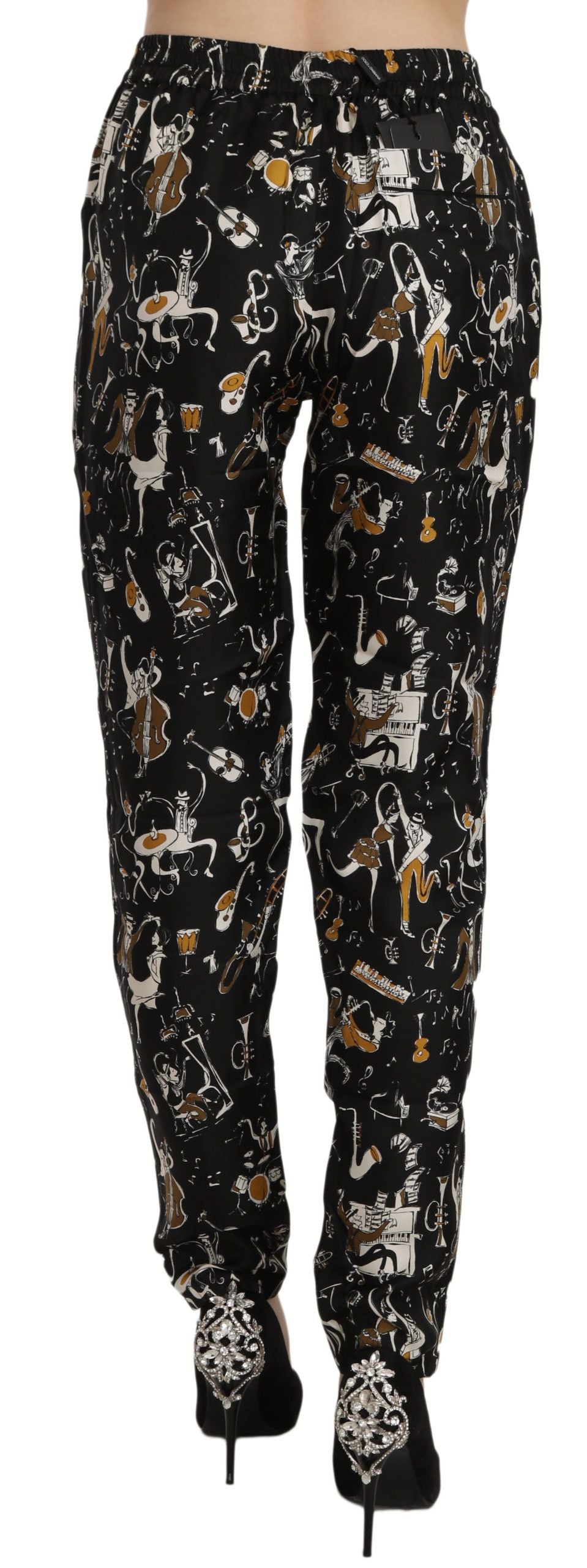 Dolce & Gabbana – Schwarze, hoch taillierte Karottenhose mit Jazz-Club-Print