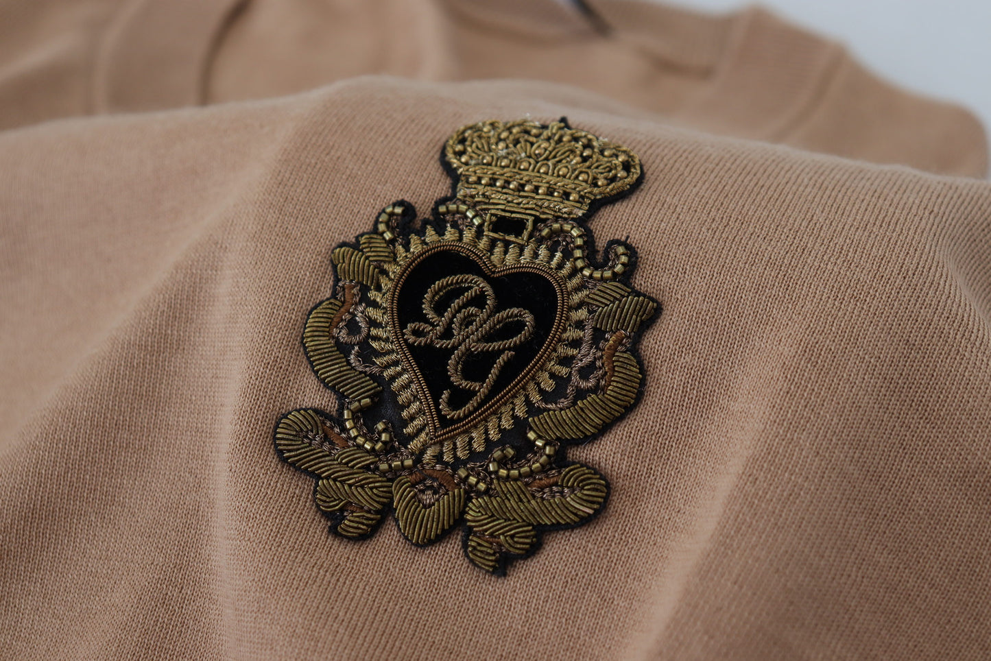 Dolce & Gabbana – Pullover aus Kaschmir mit Kronenlogo in Beige