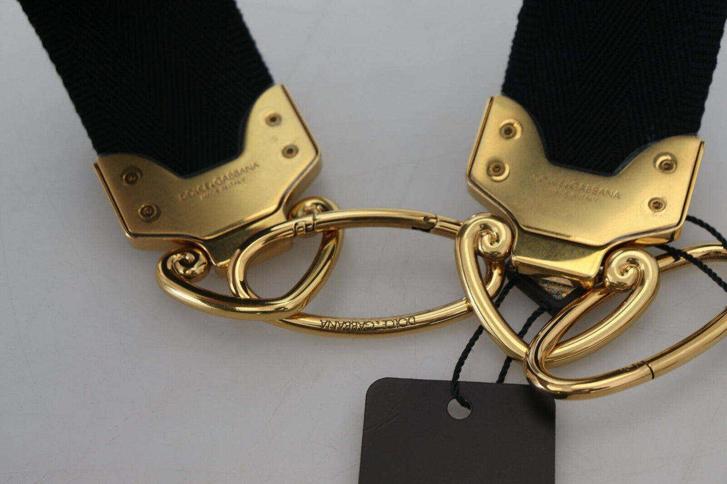 Dolce & Gabbana Schulterriemen aus Messing mit schwarzem und goldenem Logo-Print