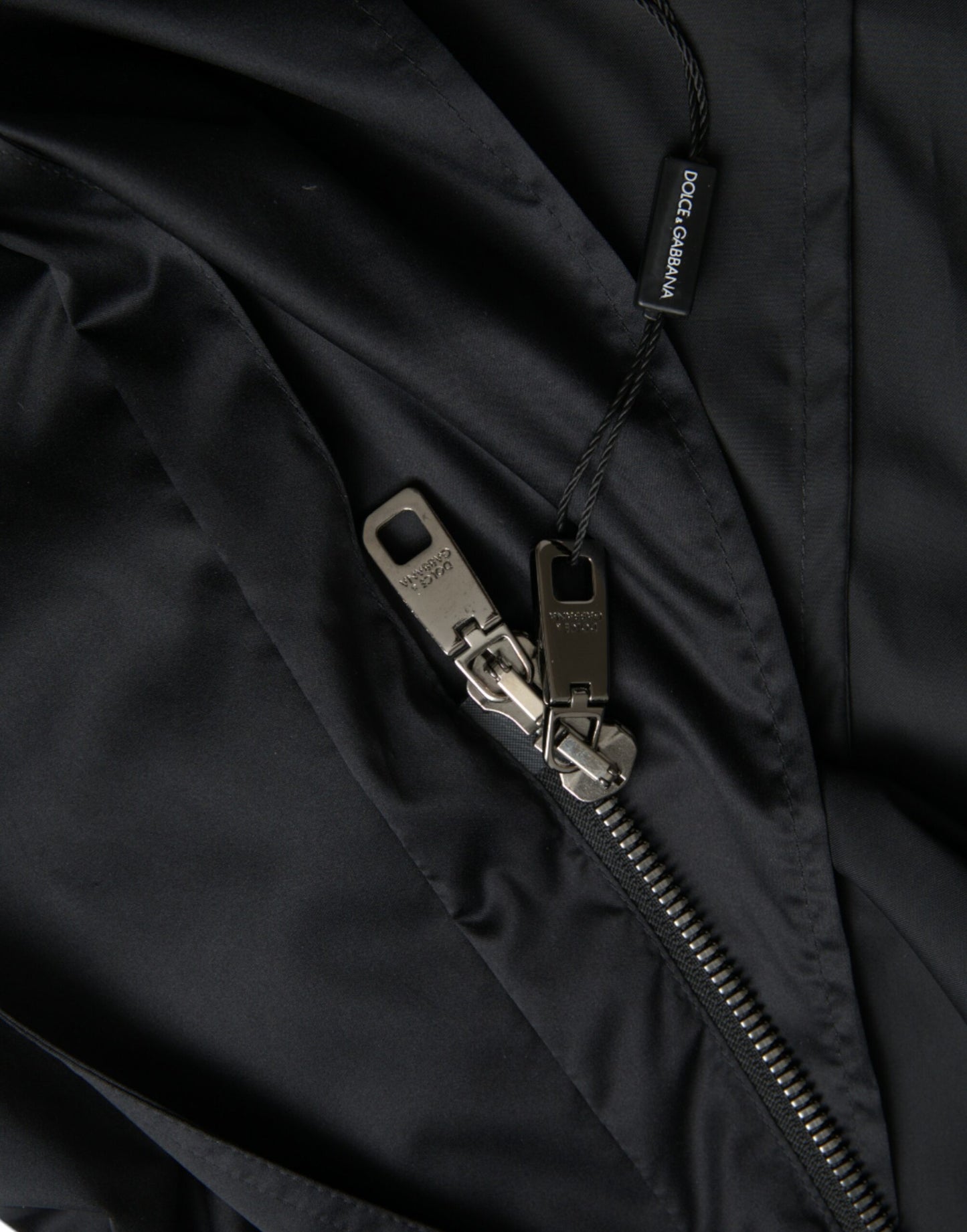 Dolce & Gabbana – Lange Windjacke aus schwarzem Polyester mit Kapuze