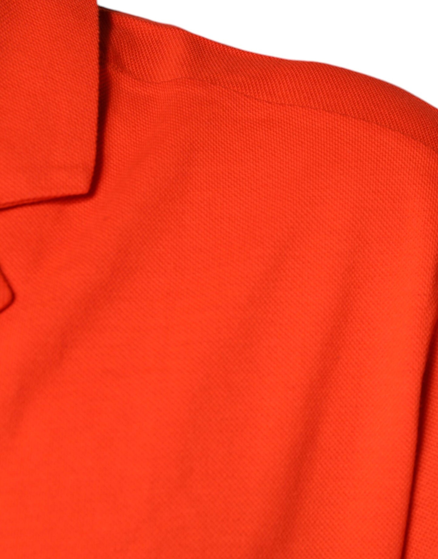 Dolce & Gabbana – Orangefarbenes, lässiges Poloshirt aus Baumwolle mit Knopfleiste