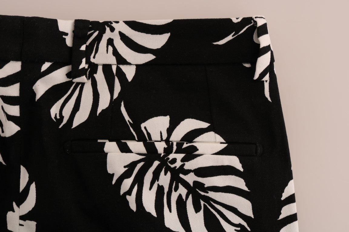 Dolce & Gabbana – Schmale Hose aus Baumwollstretch in Weiß und Schwarz mit Blattmuster