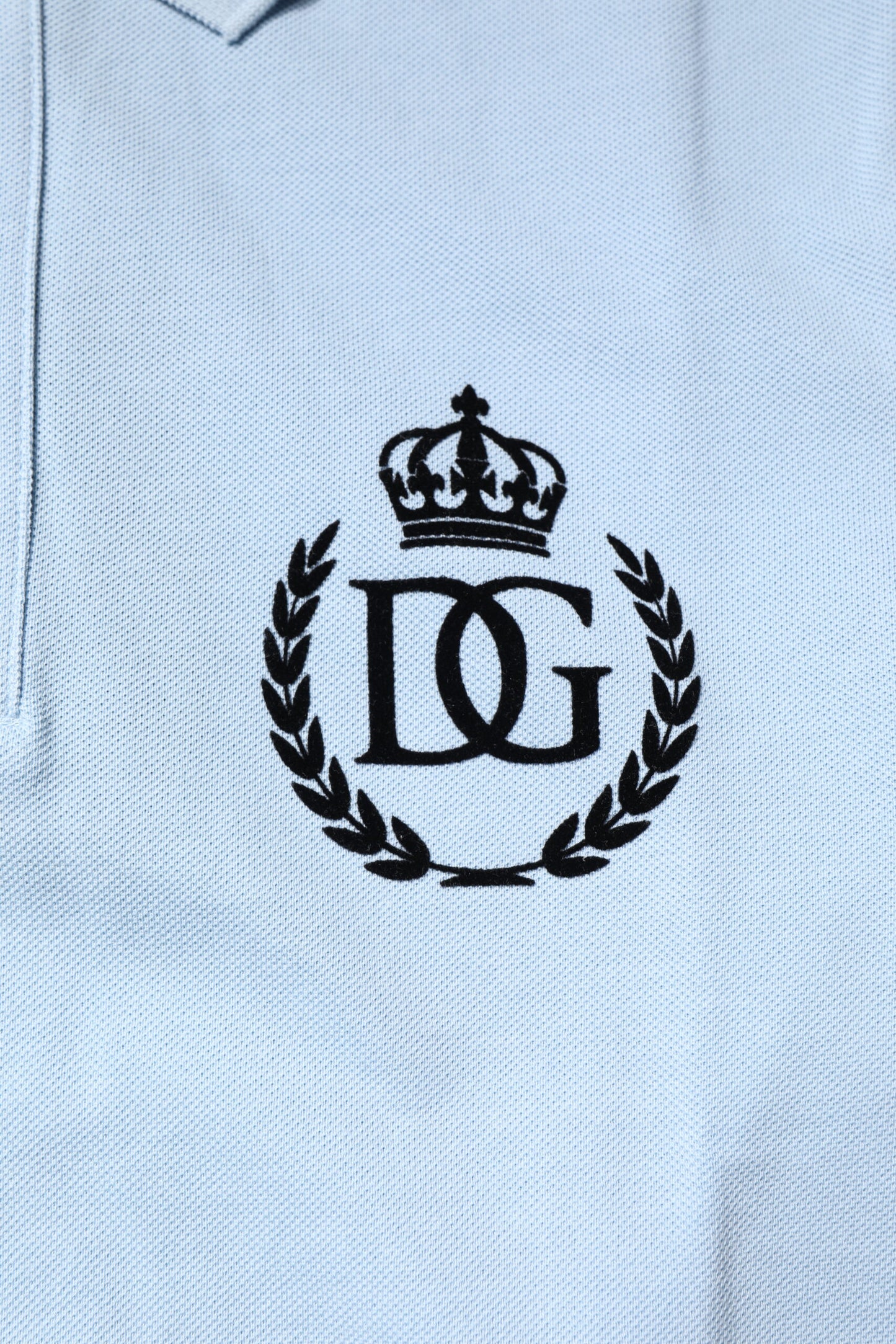 Dolce & Gabbana – Himmelblaues Polo-T-Shirt aus Baumwolle mit Kronenkragen