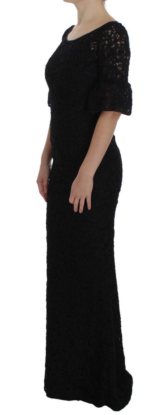 Dolce & Gabbana – Langes, figurbetontes Maxikleid aus geblümter Spitze in Schwarz