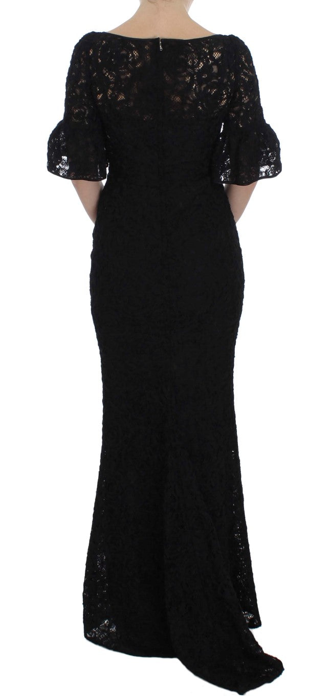 Dolce & Gabbana – Langes, figurbetontes Maxikleid aus geblümter Spitze in Schwarz