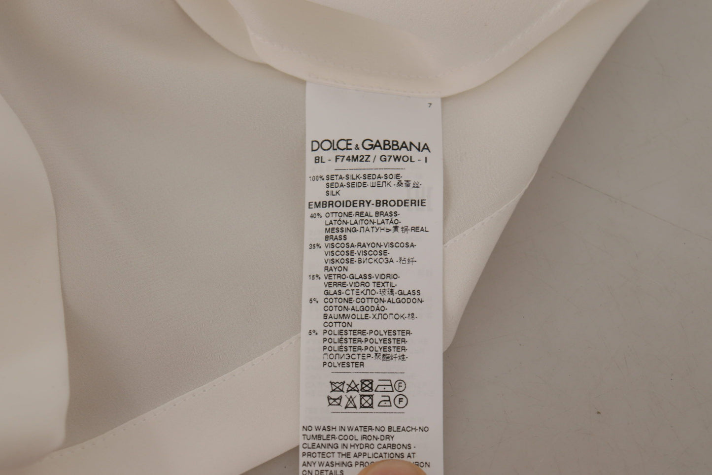 Dolce &amp; Gabbana Blusentop aus weißer Seide mit goldener DG-Krone und Kristallen