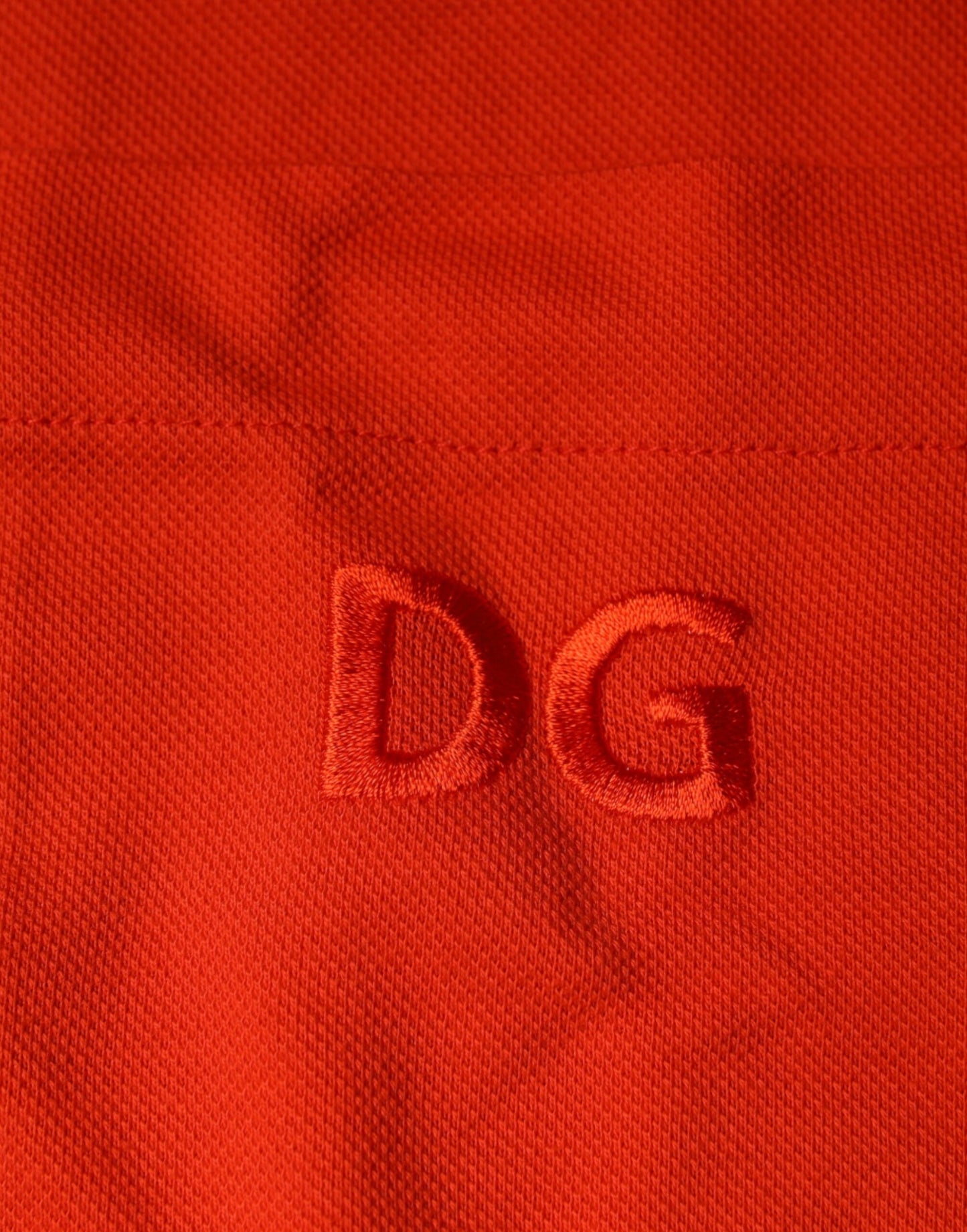 Dolce &amp; Gabbana – Orangefarbenes, lässiges Poloshirt aus Baumwolle mit Knopfleiste